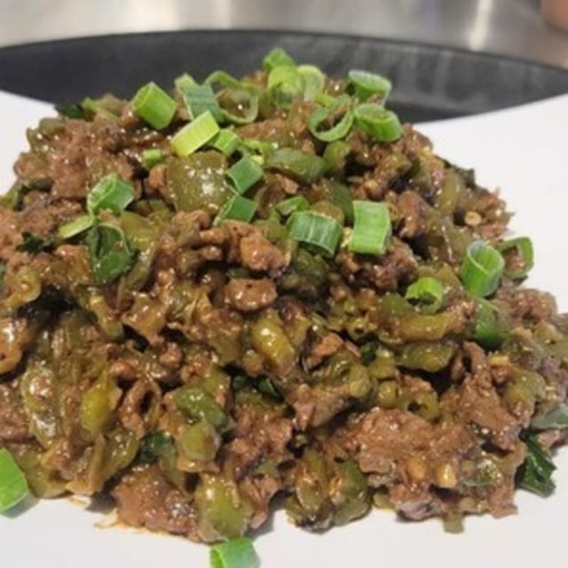 64. Pad Kra Pao.